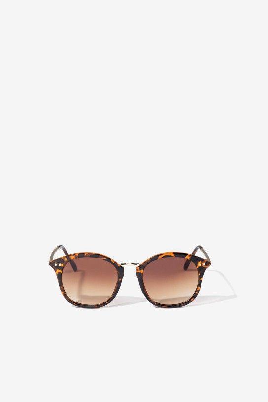 Gafas de sol con montura de pasta con formato cat eye y efecto carey
